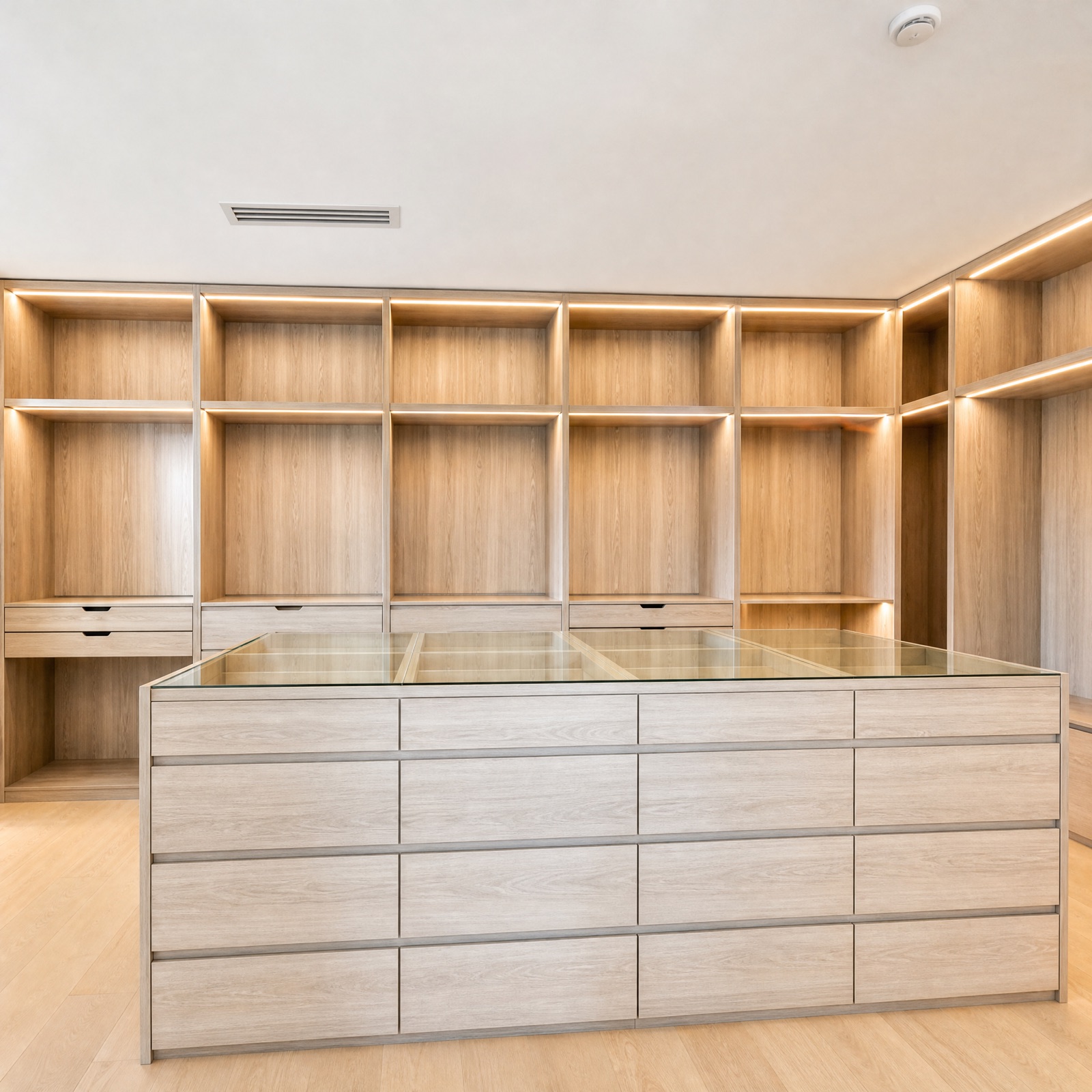 Custom walk-in closet with island built by J&R Lam Construction